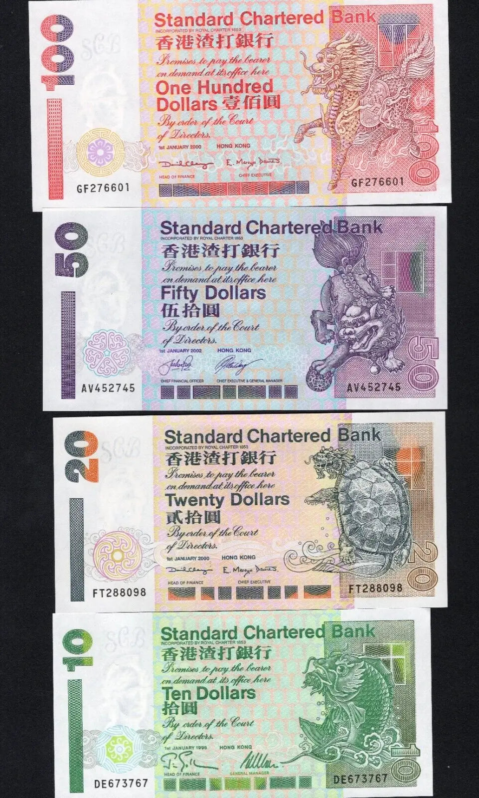 A set of 4 Hong Kong Standard Chartered banknotes ($10, $20, $50, $100) featuring mythical creatures like the Dragon Turtle and Kirin.