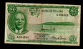 Front and back of a circulated 1964 Malawi 1 Pound banknote featuring President Hastings Banda and Lake Malawi.