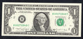 Front and back of a crisp, uncirculated Series 1988A United States 1 Dollar bill featuring George Washington.