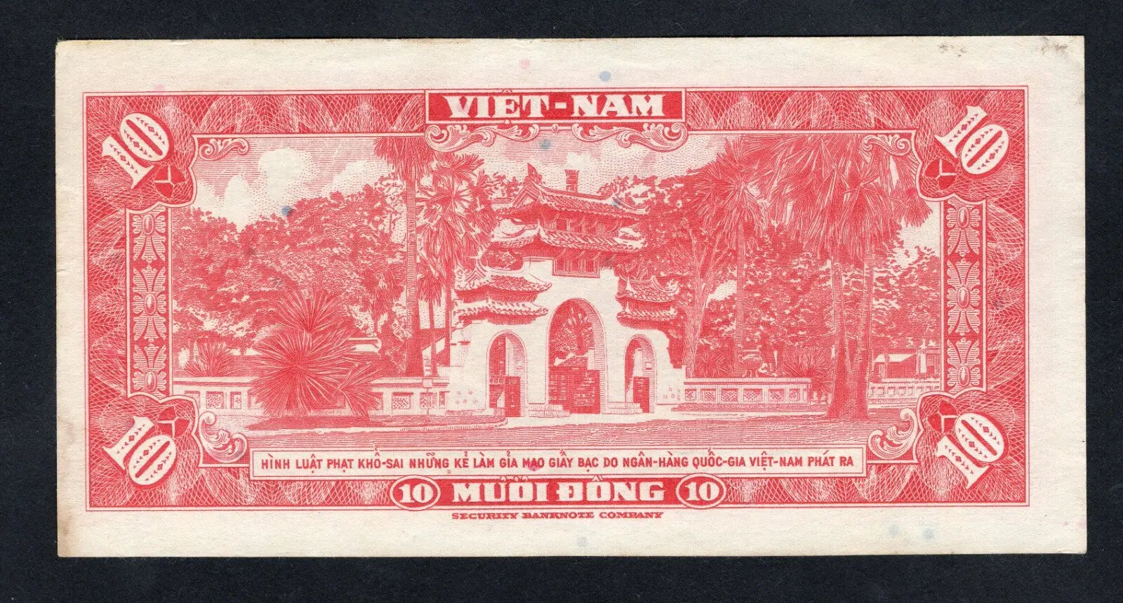 Front and back view of a red 1955 South Vietnam 10 Dong banknote, serial number 733604, featuring a farming couple.