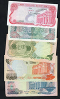 : Front view of five authentic South Vietnamese banknotes: 20, 50, 100, 500, and 1000 Dong, ranging from 1969 to 1972.