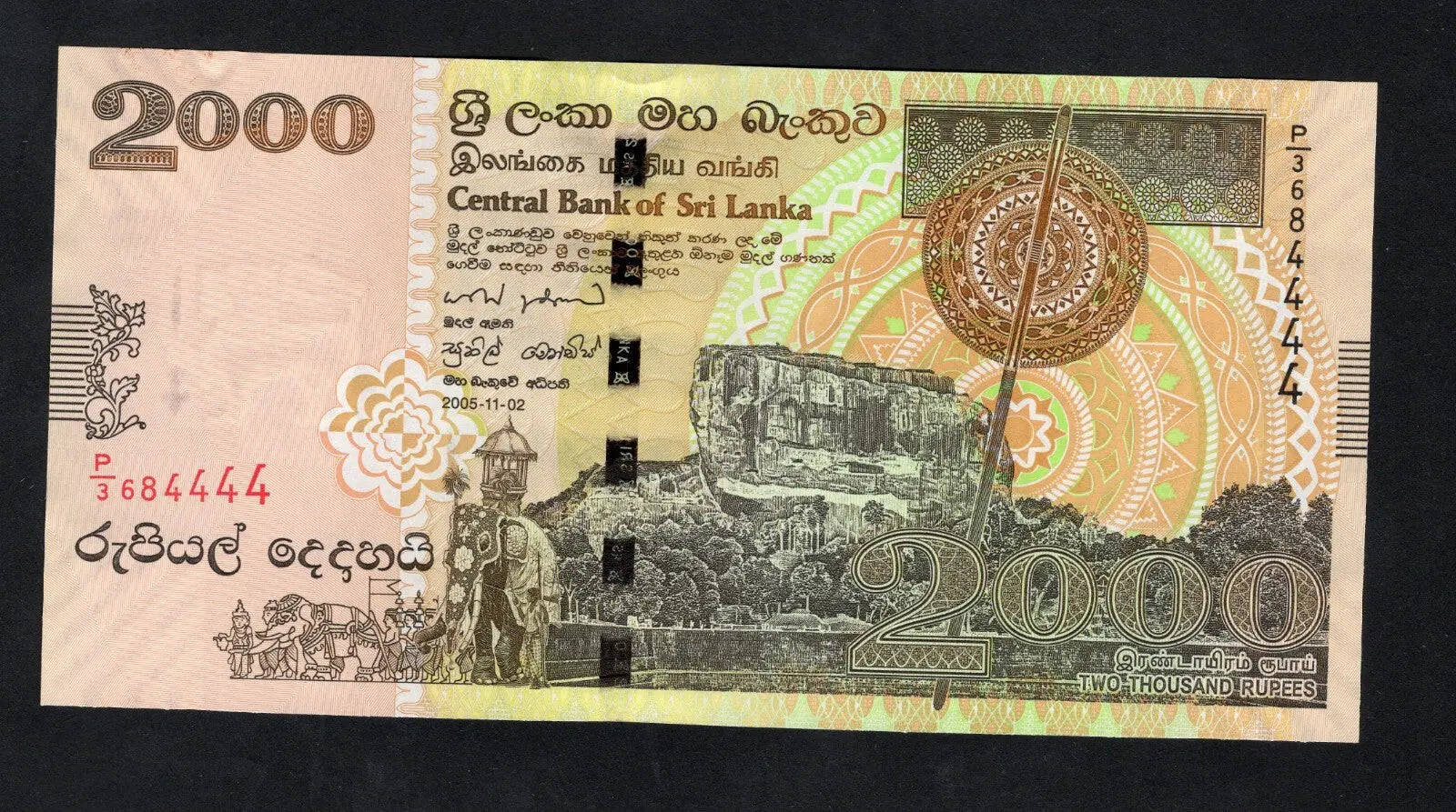 Actual photo of Sri Lanka 2000 Rupees banknote, 2005 issue, Pick 120a, serial P/3 684444, Sigiriya Rock and Elephant design, Uncirculated.