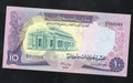 Actual photo of a 1970 Sudan 10 Pounds banknote, Pick 15a, featuring the Bank of Sudan building and Port Sudan scene in Uncirculated condition.