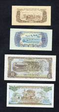 Front and back view of four Vietnamese banknotes including 10 Xu, 20 Xu, 10 Dong, and 100 Dong from various years.