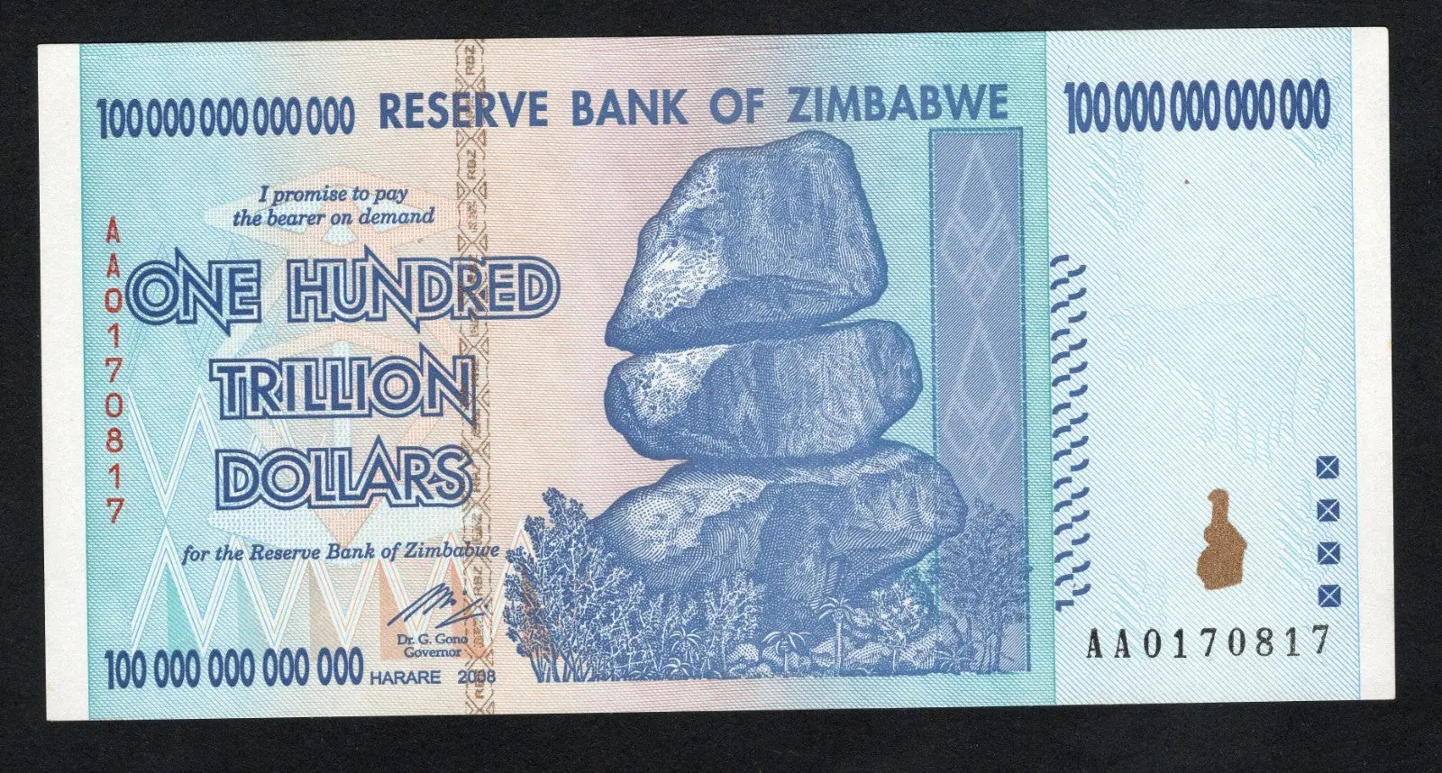Authentic 2008 Zimbabwe 100 Trillion Dollar banknote, serial number AA 0170817, featuring Balancing Rocks and Victoria Falls.