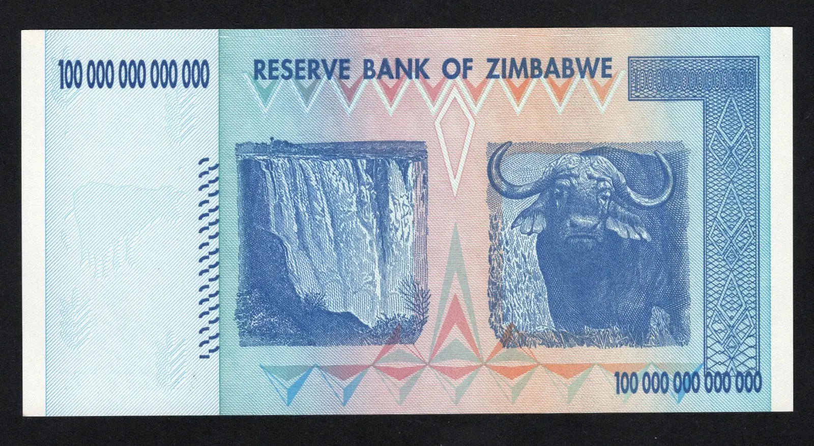 Reverse of the 100 Trillion Zimbabwe note showing Victoria Falls and a Cape Buffalo.
