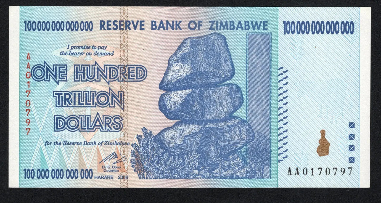 Front of a 100 Trillion Zimbabwe Dollar banknote featuring the Balancing Rocks and serial number AA0170797.