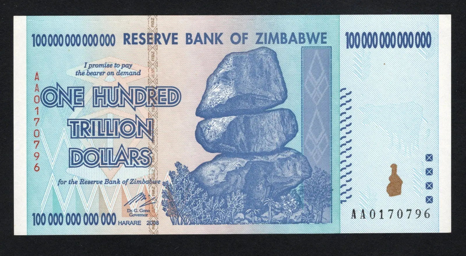 Front of an Uncirculated Zimbabwe 100 Trillion Dollars banknote featuring Balancing Rocks and serial number AA0170796