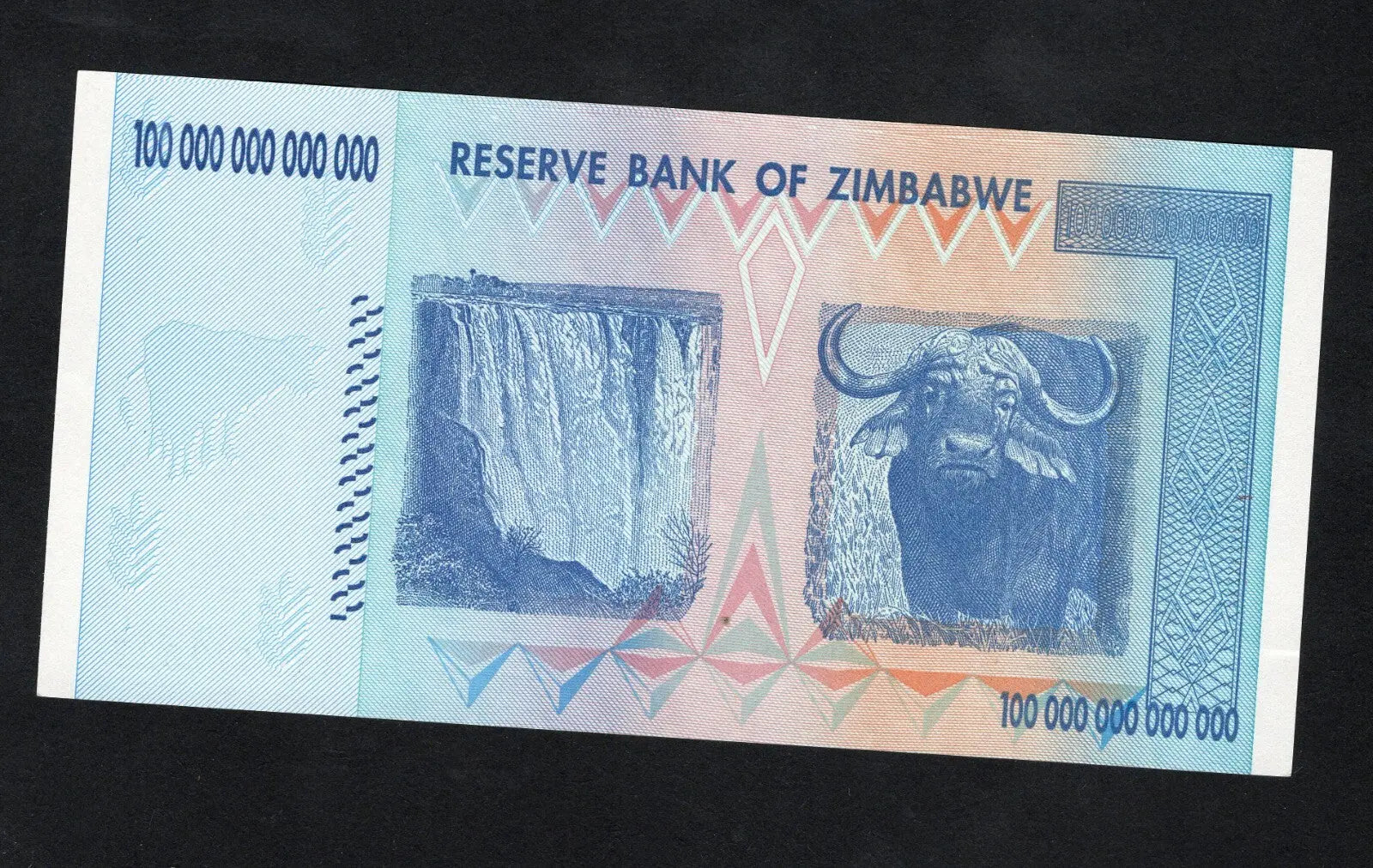 Authentic 2008 Zimbabwe 100 Trillion Dollar banknote, UNC condition, serial number AA0497327.