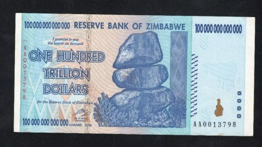 Front and back view of the specific used 2008 Zimbabwe 100 Trillion Dollar banknote for sale, serial number AA0013798.